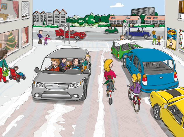 een straat met auto's en fietsers in de winter