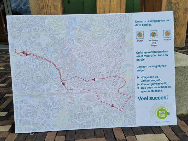 Poster met route verkeersexamen